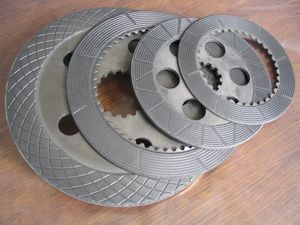 Friction plates coated with material made on the basis of ShH-15 steel powder
